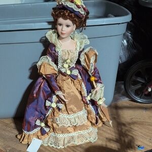 Victorian Style Porcelain Doll in Purple and Gold Dress